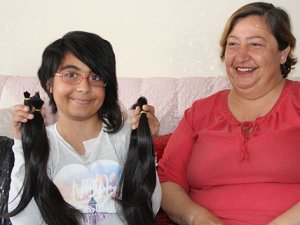 Kendisi küçük yüreği büyük Kader